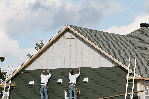 Professional Siding Replacement technician working in Round Hill, VA